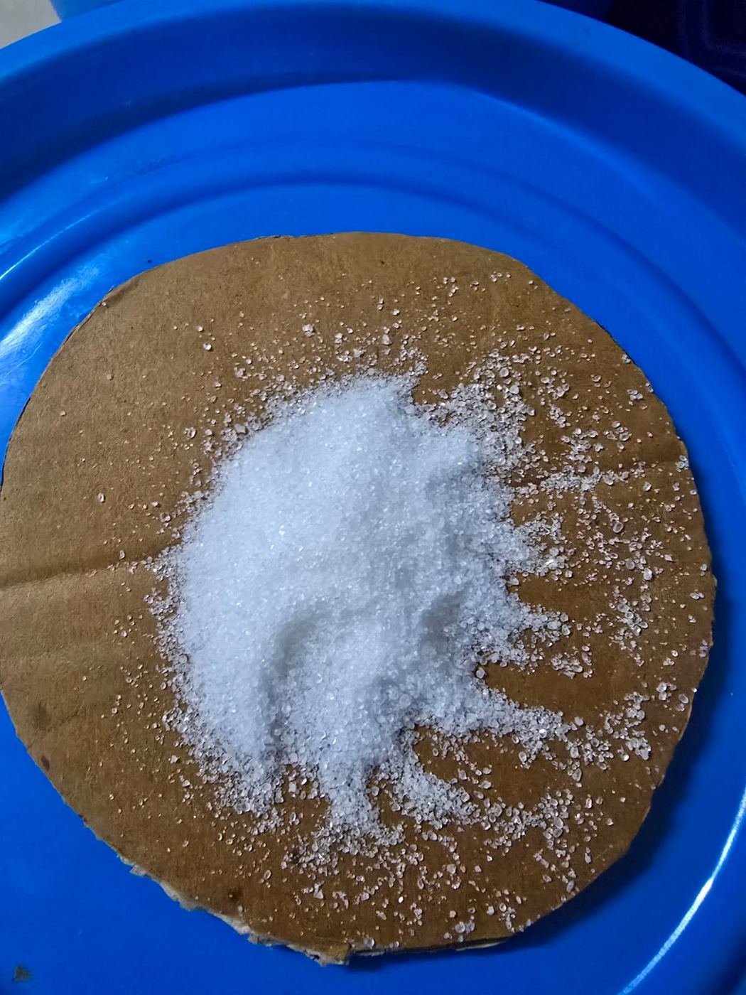 Bronopol white crystalline powder, close-up sample